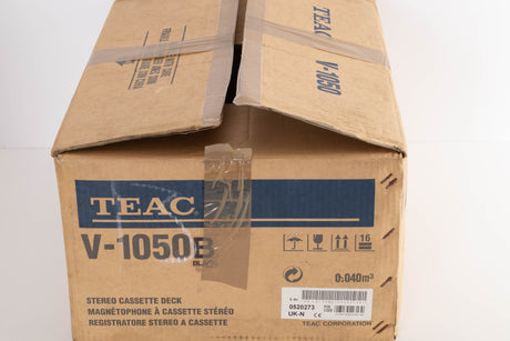 Box for a used TEAC V-1050 Cassette Deck in a Black finish