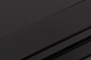 Close up of a used TEAC V-1050 Cassette Deck in a Black finish showing light scratching on front top edge