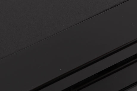 Close up of a used TEAC V-1050 Cassette Deck in a Black finish showing light scratching on front top edge