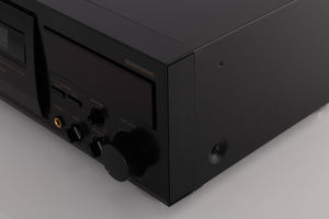 Front right corner of a used TEAC V-1050 Cassette Deck in a Black finish