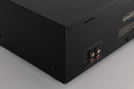 Rear right corner of a used TEAC V-1050 Cassette Deck in a Black finish
