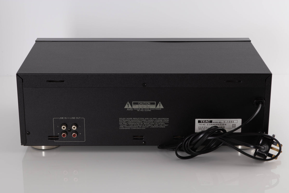 Rear view of a used TEAC V-1050 Cassette Deck in a Black finish showing Phono Inputs and Phono Outputs