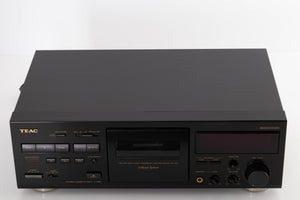 Top of a used TEAC V-1050 Cassette Deck in a Black finish