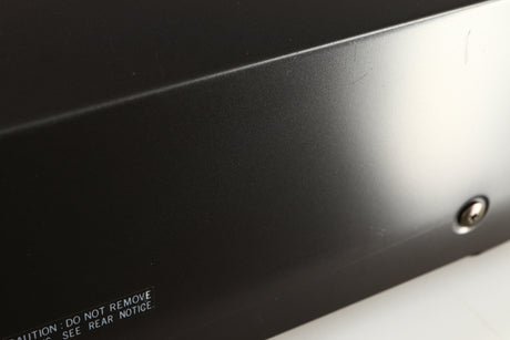 Close up of a used Technics RS-B205 Cassette Deck showing some scratching on left side