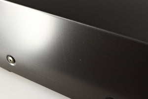 Close up of a used Technics RS-B205 Cassette Deck showing some scratching on right side