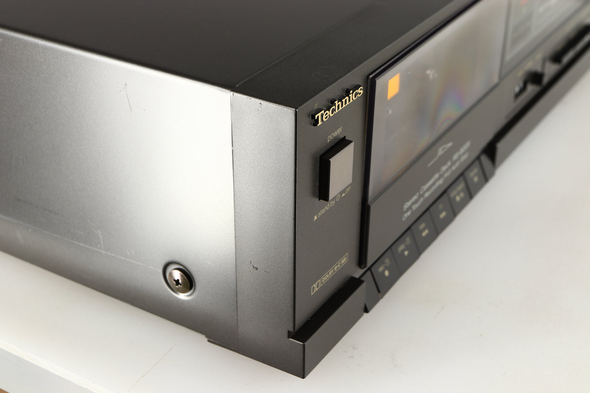Front left corner of a used Technics RS-B205 Cassette Deck