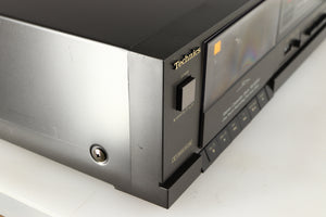 Front left corner of a used Technics RS-B205 Cassette Deck