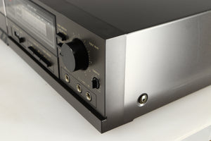 Front right corner of a used Technics RS-B205 Cassette Deck