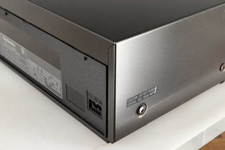 Rear left corner of a used Technics RS-B205 Cassette Deck