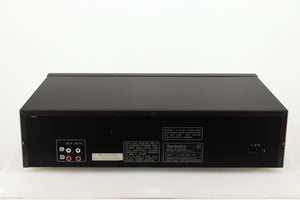 Rear view of a used Technics RS-B705 Cassette Deck in a black finish showing Phono Inputs and Outputs and Power Input