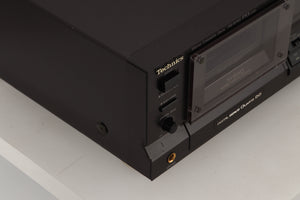 Front left corner view of a used Technics RS-B765 3-Head Cassette Deck