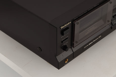 Front left corner view of a used Technics RS-B765 3-Head Cassette Deck