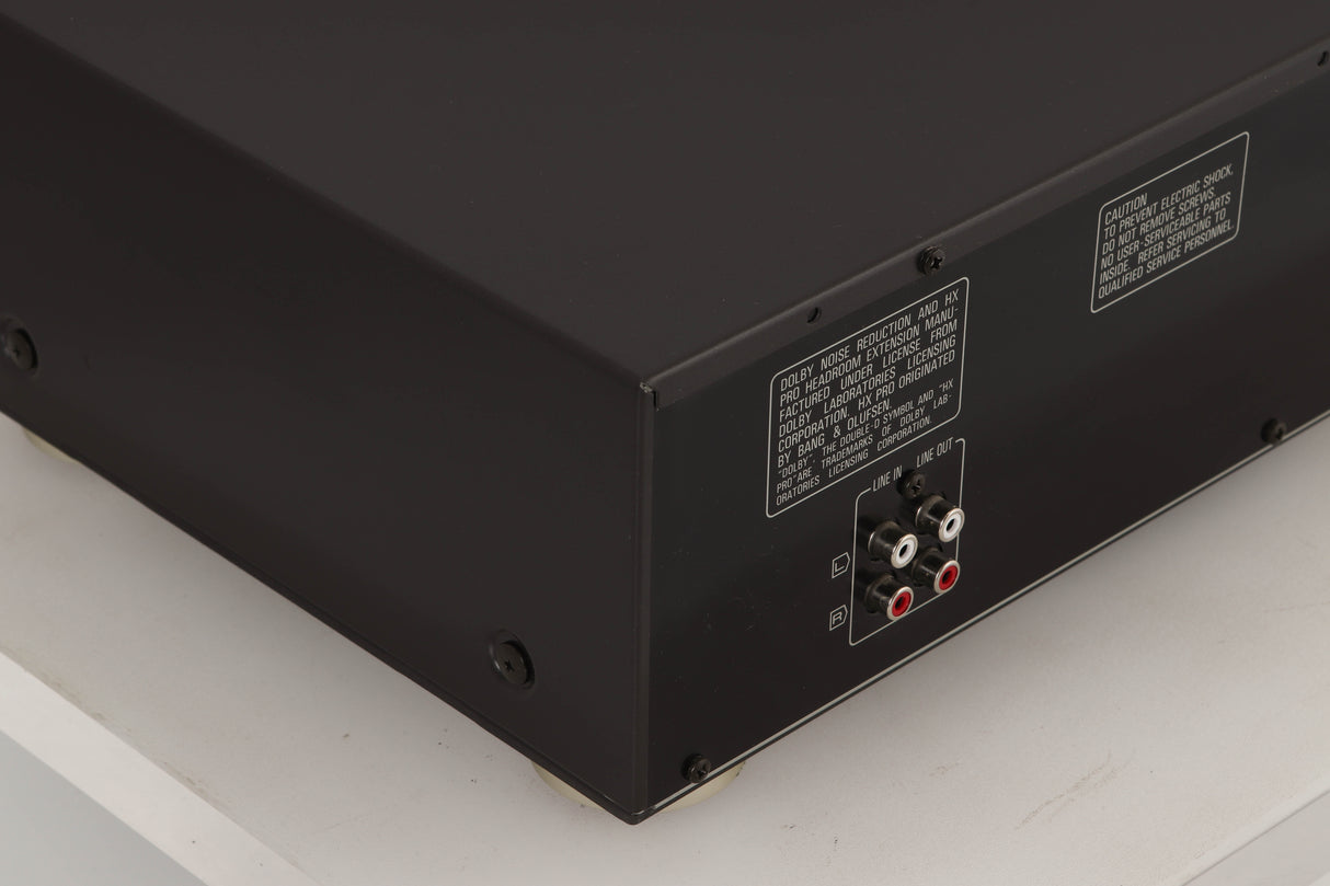 Rear left corner view of a used Technics RS-B765 3-Head Cassette Deck