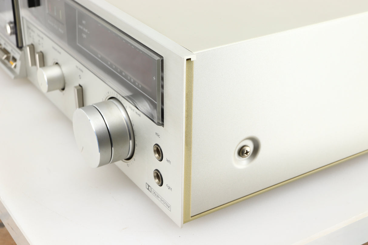 Front right corner of a used Technics RS-M225 Cassette Deck in a silver finish 