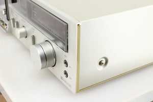 Front right corner of a used Technics RS-M225 Cassette Deck in a silver finish 