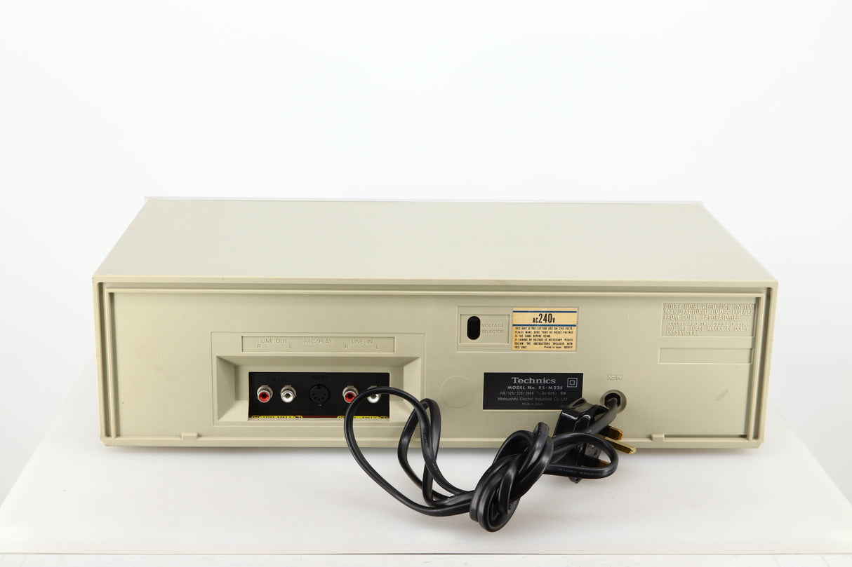 Rear view of a used Technics RS-M225 Cassette Deck in a silver finish showing Phono Inputs and Outputs