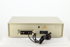 Rear view of a used Technics RS-M225 Cassette Deck in a silver finish showing Phono Inputs and Outputs