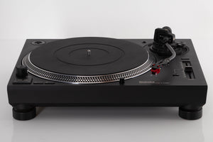Front view of a used Technics SL-1210 MK7 Turntable with AT-40ML Cartridge