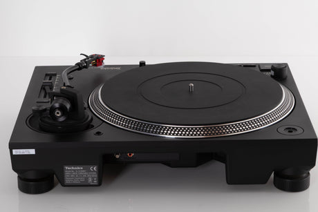 Rear view of a used Technics SL-1210 MK7 Turntable with AT-40ML Cartridge