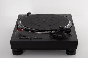 Side view of a used Technics SL-1210 MK7 Turntable with AT-40ML Cartridge