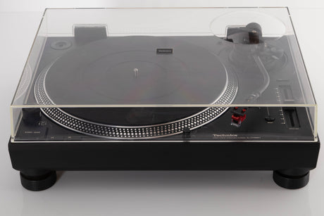 Top view of a used Technics SL-1210 MK7 Turntable with AT-40ML Cartridge
