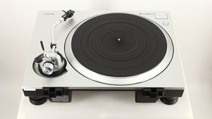 Rear view of a used Technics SL-1500C Turntable in a silver finish