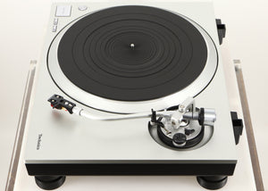 Right side view of a used Technics SL-1500C Turntable in a silver finish
