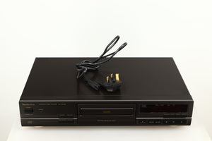 Top of a used Technics SL-PG390EB-K CD Player in a grey finish showing Power Cable