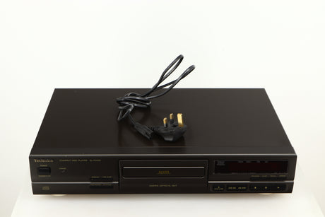 Top of a used Technics SL-PG390EB-K CD Player in a grey finish showing Power Cable