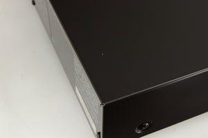 Close up  of a used Technics SL-PG390EB-K CD Player in a grey finish showing some damage on top