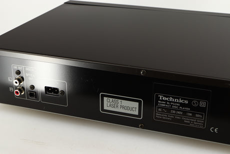 Close up of a used Technics SL-PG390EB-K CD Player in a grey finish showing some scratching on rear