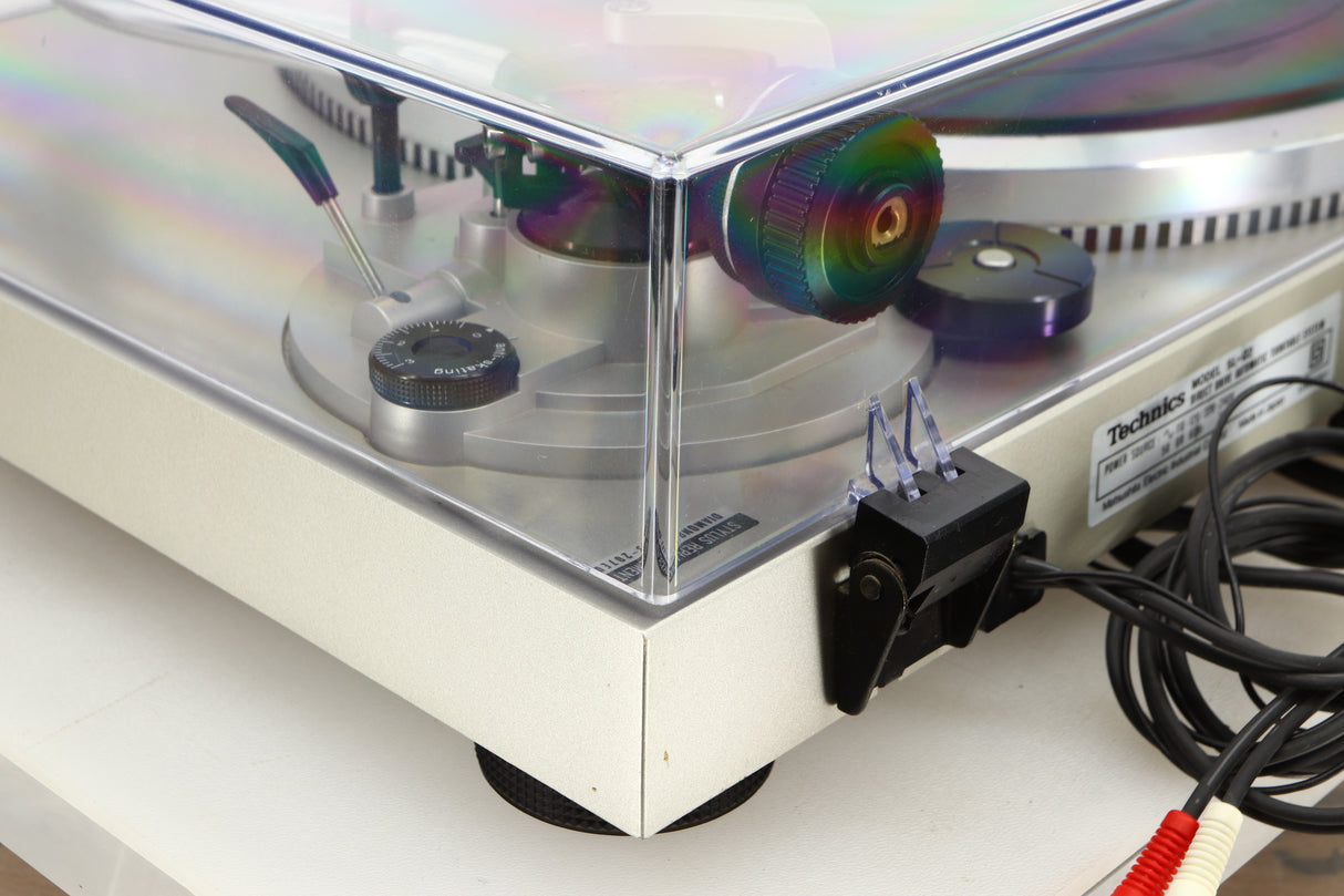 Rear left corner view of a used Technics SL-Q2 Direct Driver Turntable in Silver