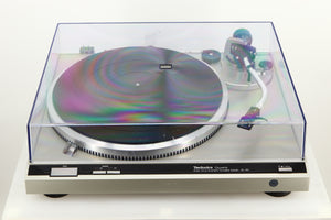 Top view of a used Technics SL-Q2 Direct Driver Turntable in Silver with lid