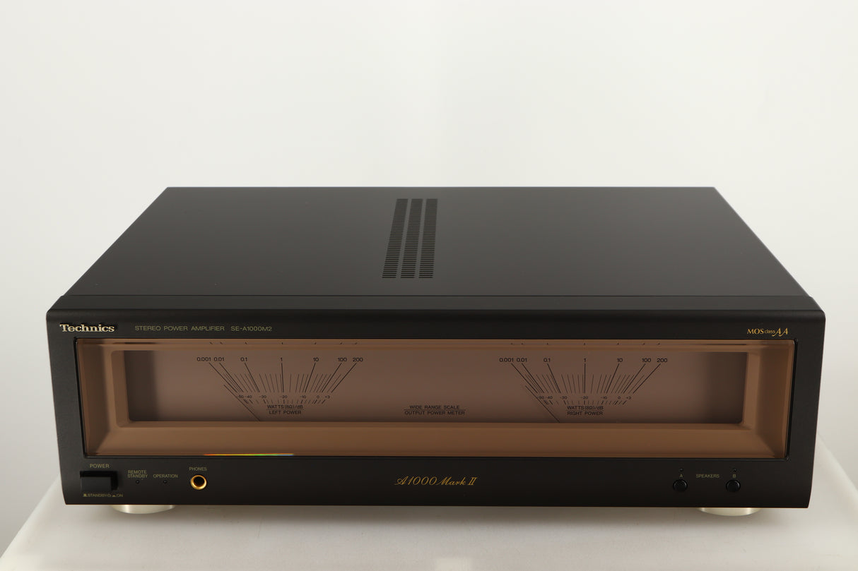 Front view of a used Technics SE-A1000M2 Power Amplifier in a black finish