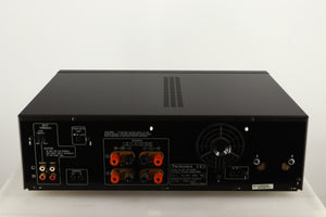 Rear view of a used Technics SE-A1000M2 Power Amplifier in a black finish showing Speaker Outputs, Phono Inputs and Power Input