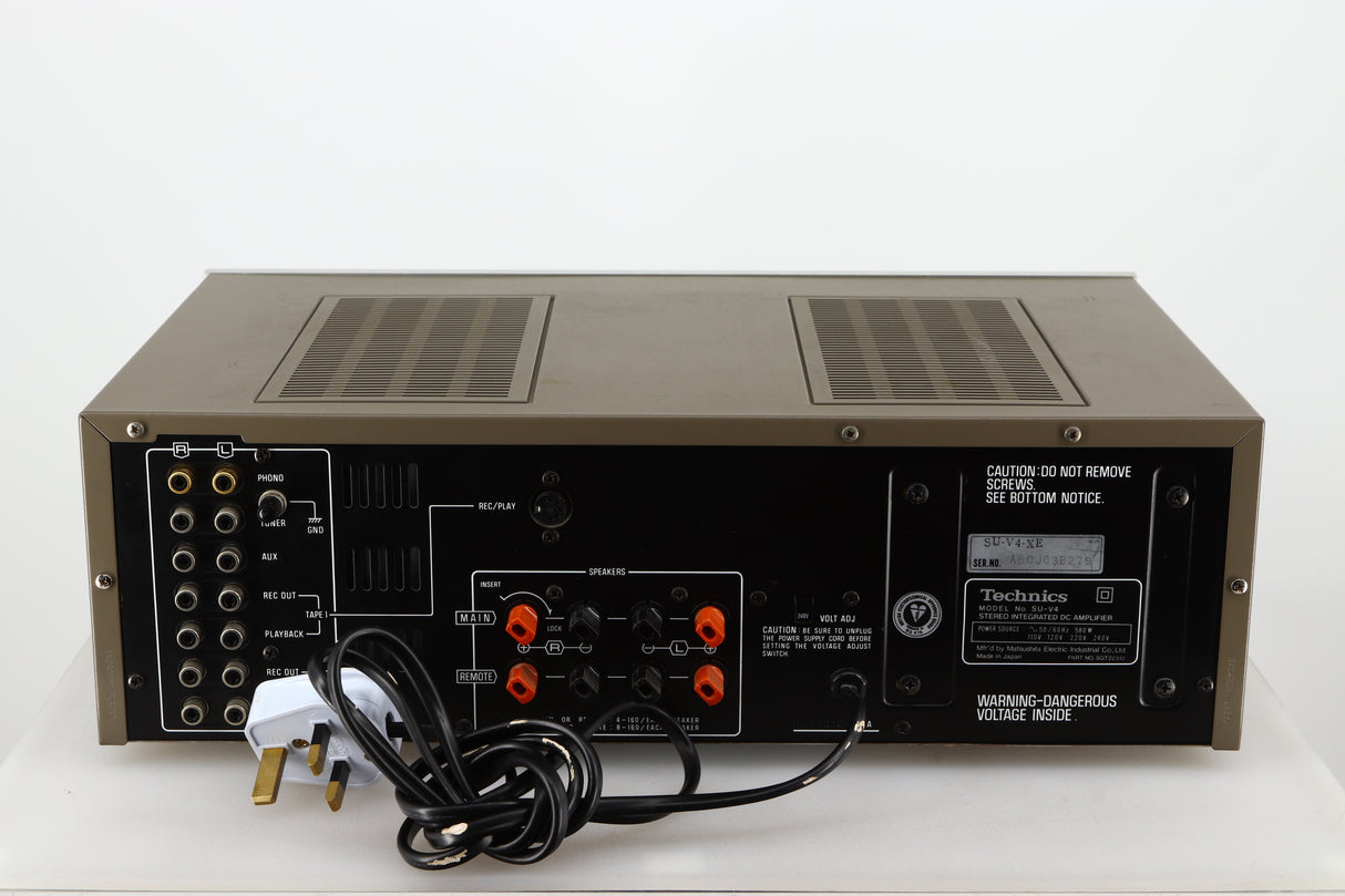 Rear view of a used Technics SU-V4 Integrated Amplifier in a silver finish showing Phono Inputs and Speaker Inputs