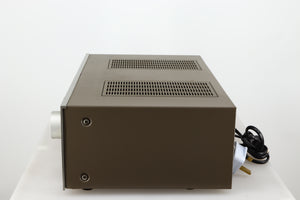 Right side view of a used Technics SU-V4 Integrated Amplifier in a silver finish