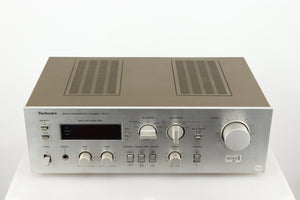 Top of a used Technics SU-V4 Integrated Amplifier in a silver finish