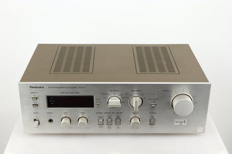 Top of a used Technics SU-V4 Integrated Amplifier in a silver finish