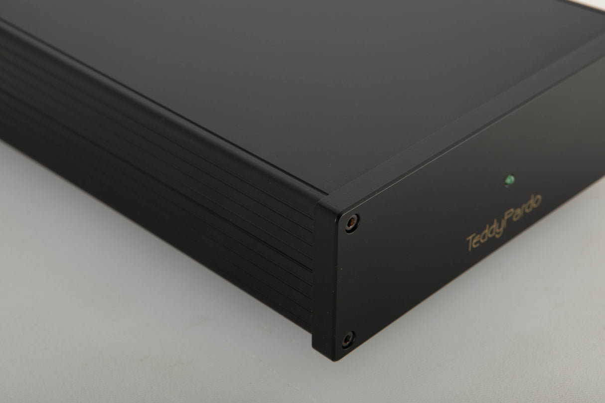 Front left corner view of a used Teddy Pardo TeddyCapPlus Power Supply
