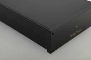 Front left corner view of a used Teddy Pardo TeddyCapPlus Power Supply