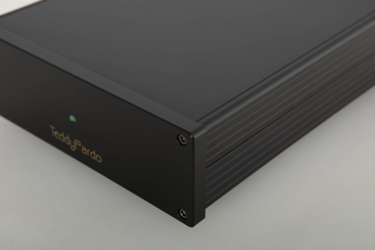 Front right corner view of a used Teddy Pardo TeddyCapPlus Power Supply