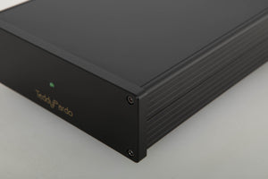 Front right corner view of a used Teddy Pardo TeddyCapPlus Power Supply