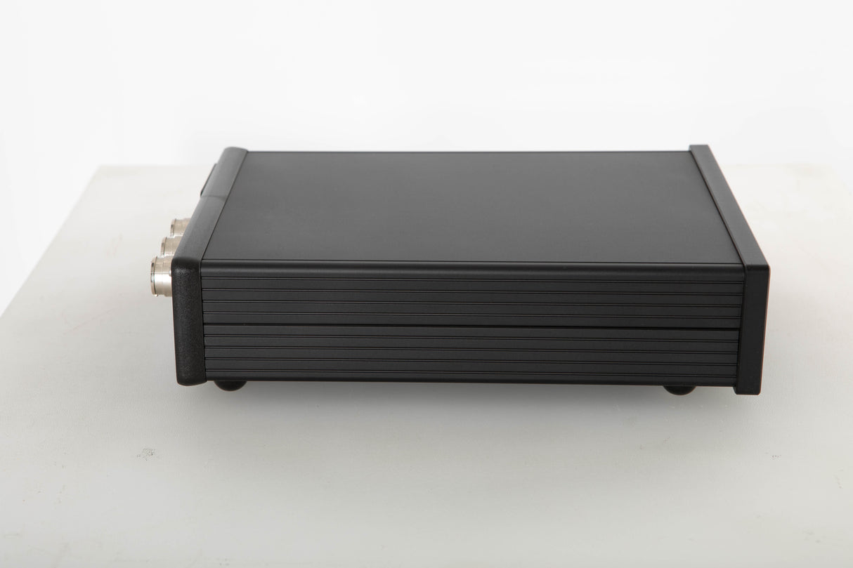 Side view of a used Teddy Pardo TeddyCapPlus Power Supply
