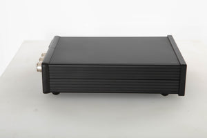 Side view of a used Teddy Pardo TeddyCapPlus Power Supply