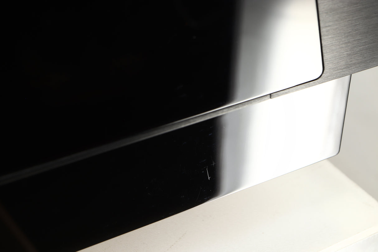 Close up view of a used The Gryphon Diablo 300 Integrated Amplifier showing some scratching 
