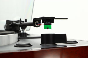 Close up view of a used Thorens TD-102A Turntable in Walnut finish showing the cartridge