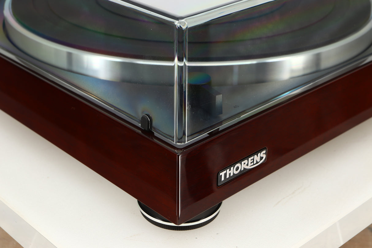 Front left corner view of a used Thorens TD-102A Turntable in Walnut finish