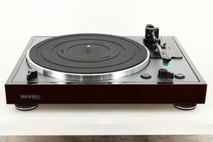Front view of a used Thorens TD-102A Turntable in Walnut finish