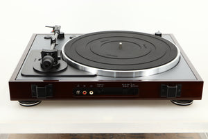 Rear view of a used Thorens TD-102A Turntable in Walnut finish